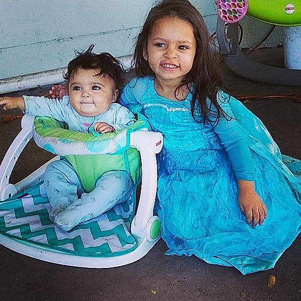 Jadalynn joined the competition — help win amazing prizes! chair, child, daughter, family, fun, happy, joy, leisure, mother, person, sibling, sitting, smile, toddler, vacation