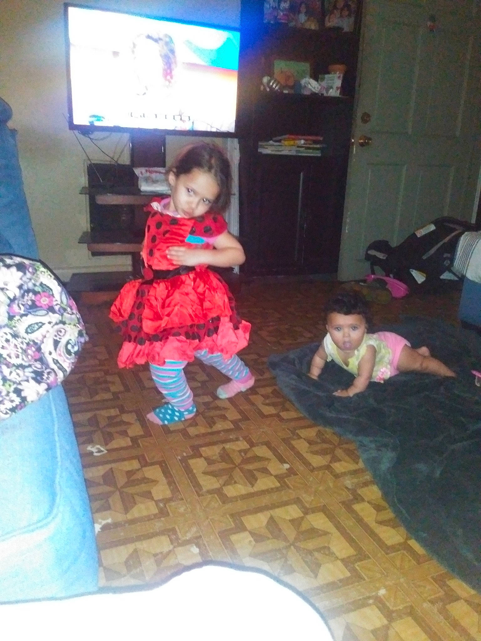 Jadalynn is registered to the contest to win money with this photo: child, electronic_device, floor, flooring, fun, house, person, play, room, technology, toddler