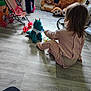 Mayllie a rejoint le concours — aidez-le/la à gagner de superbes lots ! child, toddler, pink_pajamas, stuffed_animal, blue_dragon, toy, floor, wooden_floor, indoor, play, feeding, spoon, plush_toy, clothing, furniture, bear_toy, baby_stroller, wheel, home, room