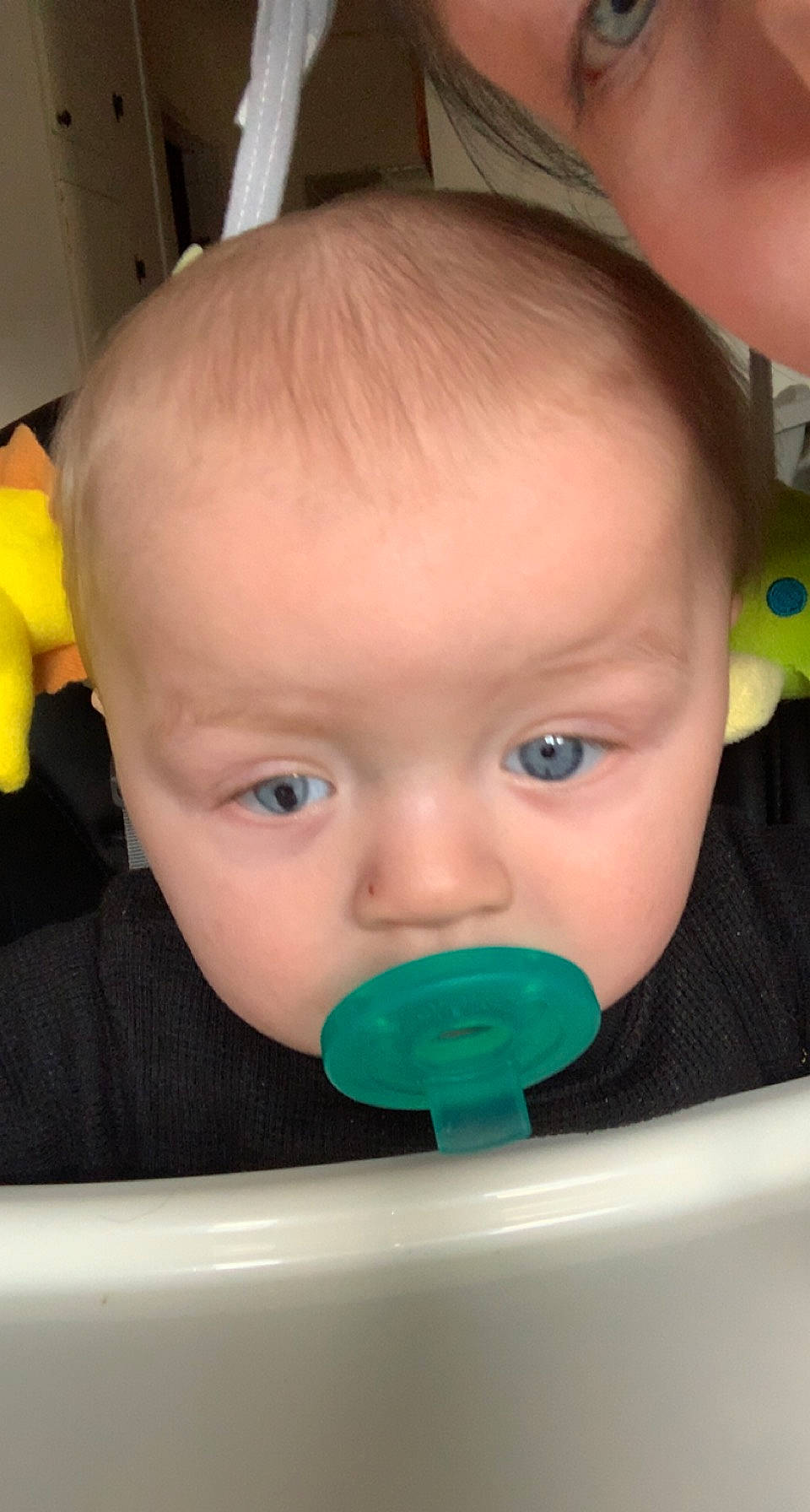 Mathew joined the competition — help win amazing prizes! audio_equipment, baby, baby_playing_with_toys, baby_products, cheek, child, close_up, ear, eyelash, facial_expression, fun, green, hairstyle, happy, iris, mouth, nose, organ, person, skin