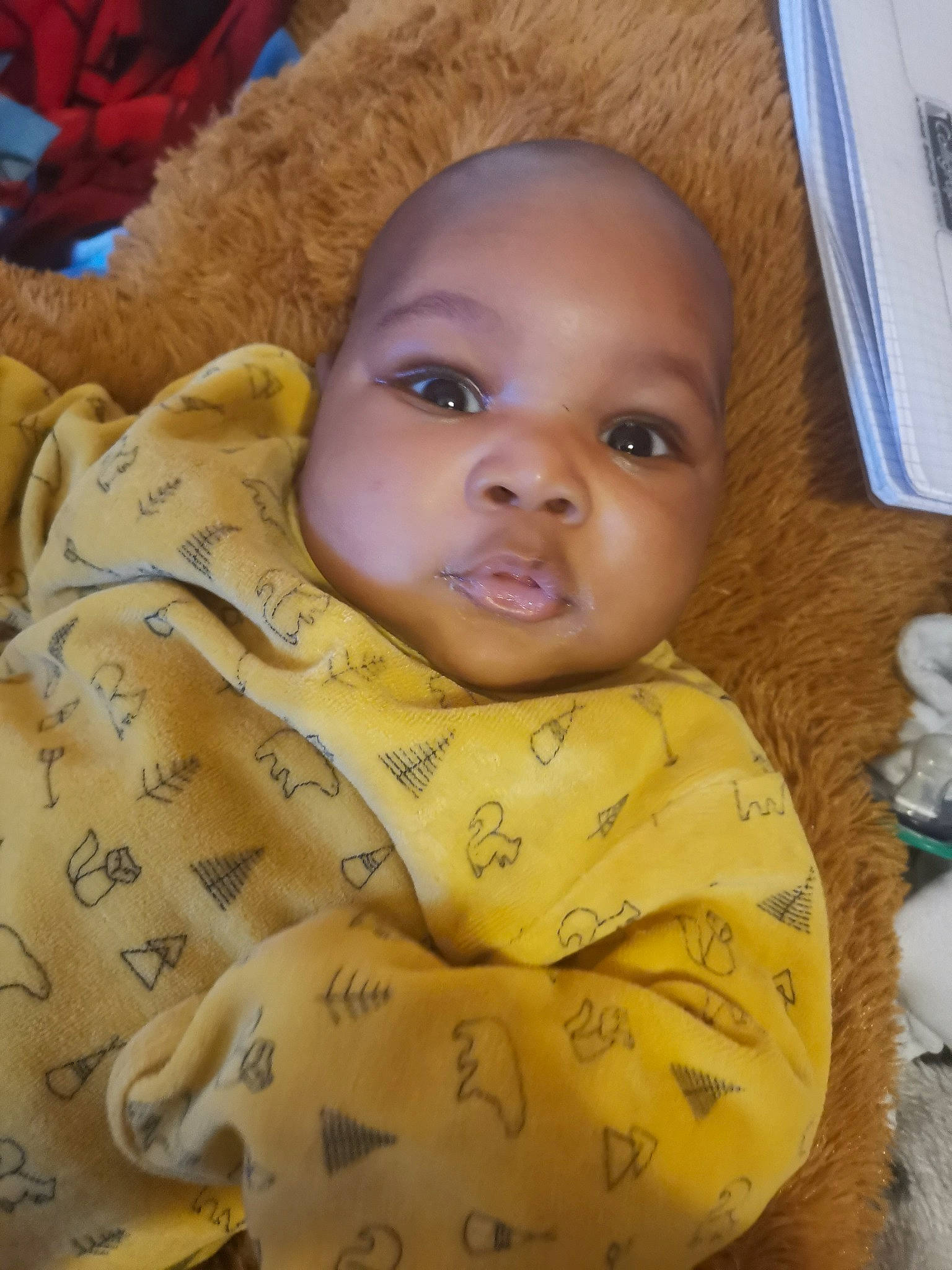 Zachary participe au concours pour gagner de l'argent avec cette photo : baby, baby_toddler_clothing, cheek, child, chin, comfort, eye, eyelash, flooring, happy, head, human_body, iris, linens, lip, nose, person, room, skin, smile