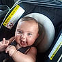 Ivy joined the competition — help win amazing prizes! baby, car_seat, smile, happy, child, infant, seatbelt, face, skin, hand, expression, indoors, safety, warning_label, person, cute, head, closeup, seat, straps