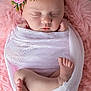 baby, newborn, sleeping, flower_crown, blanket, pink, soft_texture, basket, infant, peaceful, cute, wrapped, headwear, resting, portrait, small_feet, cozy, child, adorable, toddler