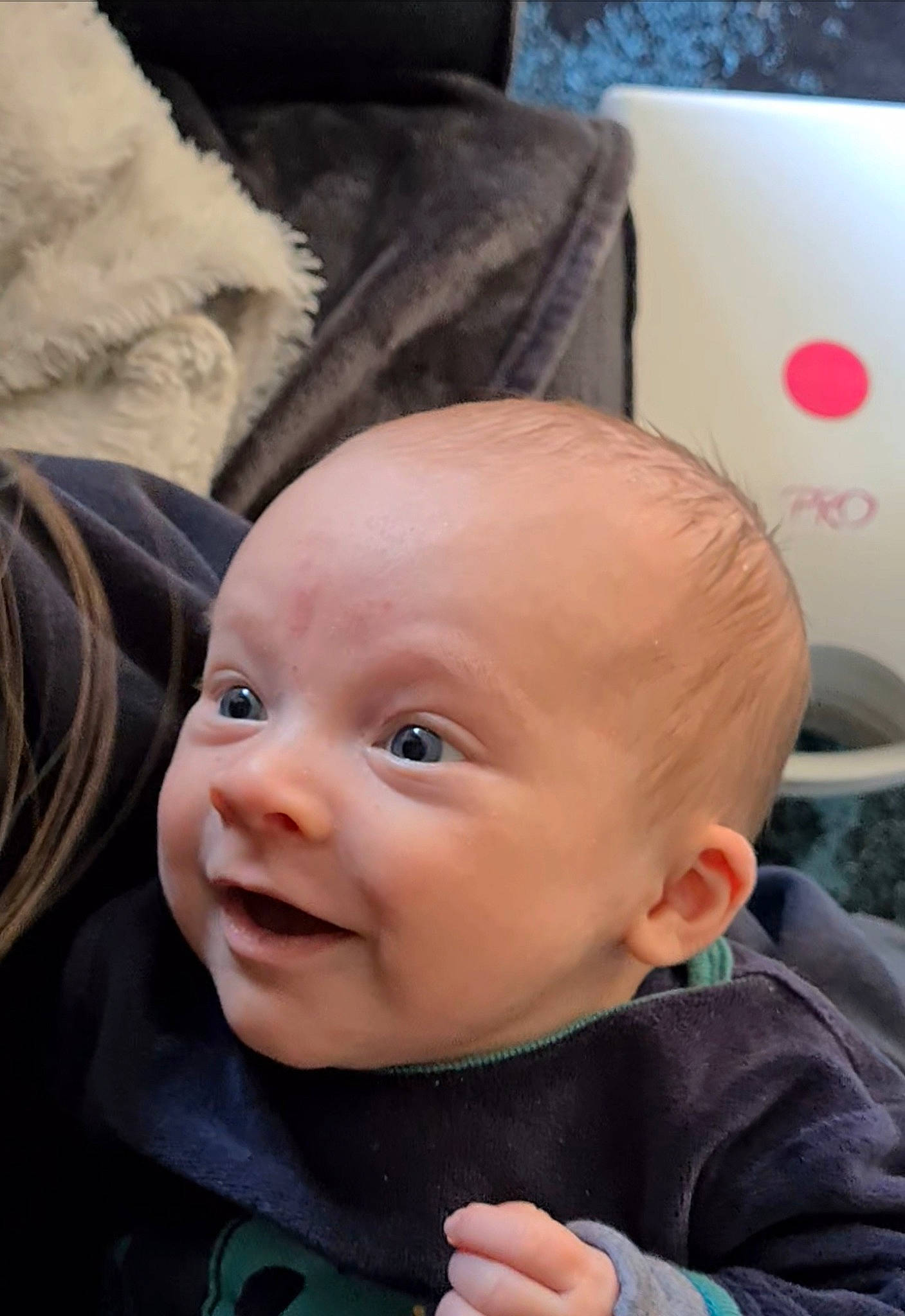 Théo participe au concours pour gagner de l'argent avec cette photo : baby, baby_toddler_clothing, blue, cheek, chin, comfort, eye, eyebrow, eyelash, fun, happy, head, iris, lip, mouth, nose, person, skin, smile, toddler