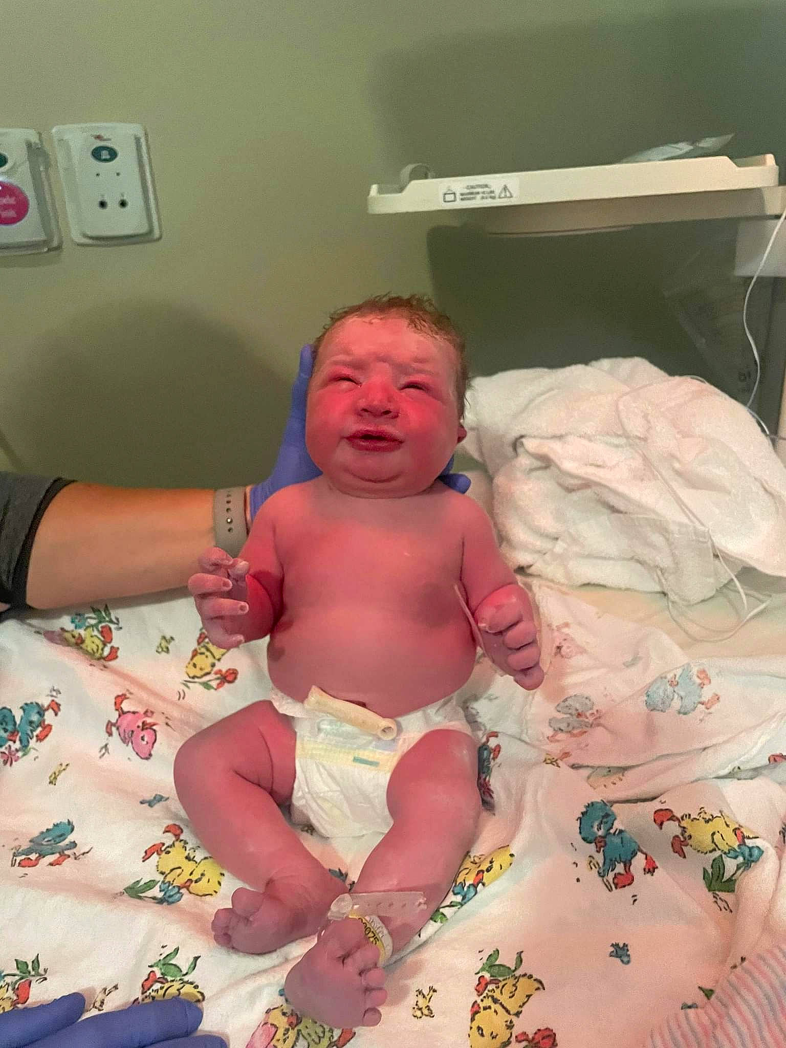 Raelynn is registered to the contest to win money with this photo: abdomen, baby, baby_products, chest, child, comfort, diaper, event, finger, light_switch, linens, mouth, pediatrics, person, room, service, skin, stomach, thumb, toddler