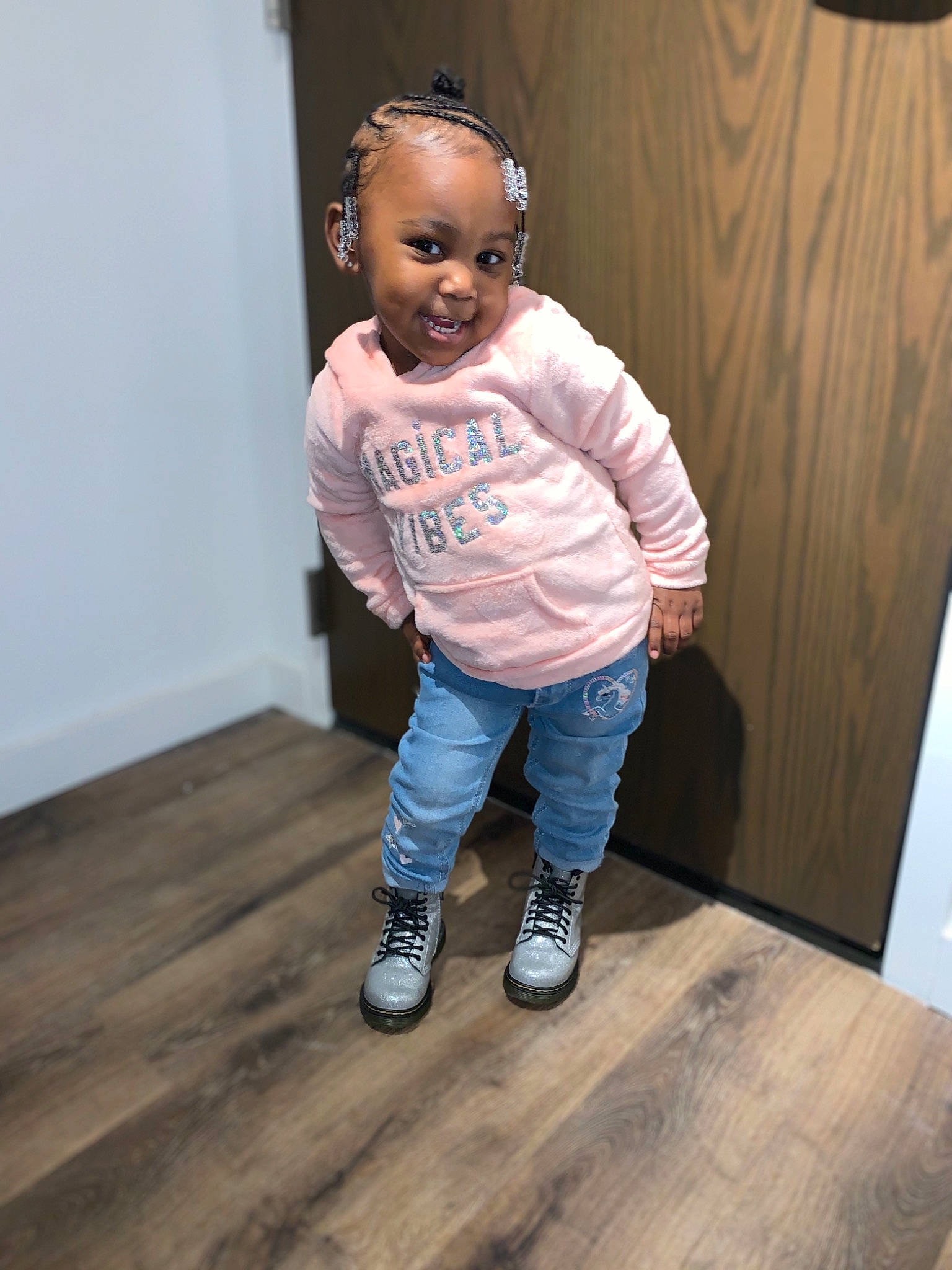 Maliah is registered to the contest to win money with this photo: baby, cheek, child, cool, floor, flooring, footwear, happy, hardwood, jeans, person, pink, play, shoe, standing, t_shirt, toddler, wood, wood_flooring