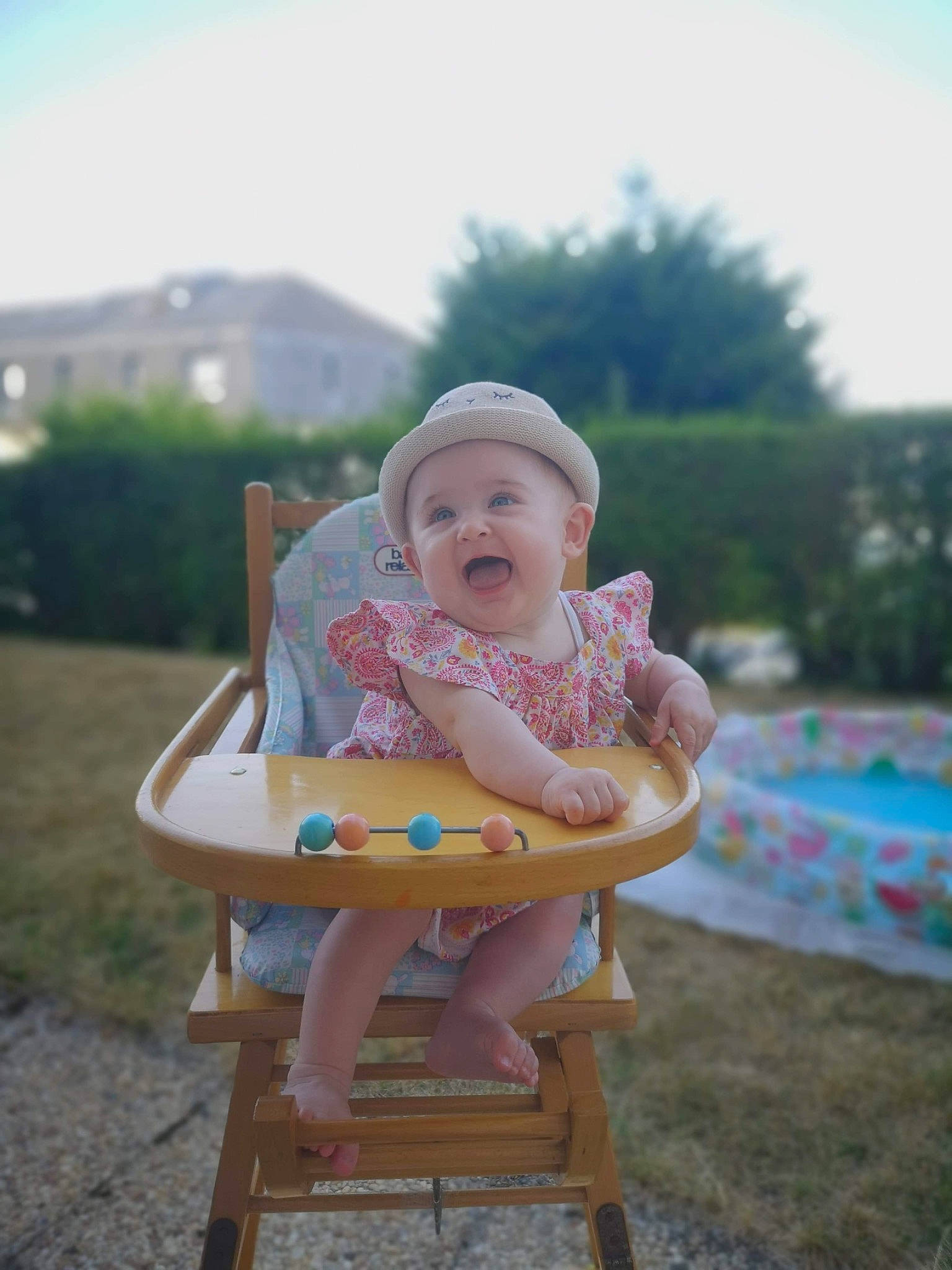 Olivia a rejoint le concours — aidez-le/la à gagner de superbes lots ! baby, chair, child, furniture, grass, headwear, leisure, person, pink, product, sitting, skin, smile, summer, toddler, vacation