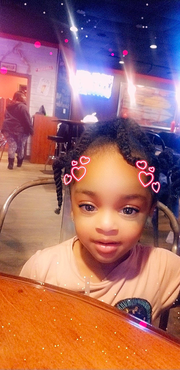 Jada is registered to the contest to win money with this photo: beauty, black_hair, cheek, child, cool, cornrows, eye, eyebrow, face, forehead, fun, hair, hair_accessory, hairstyle, head, human, long_hair, nose, person, photography