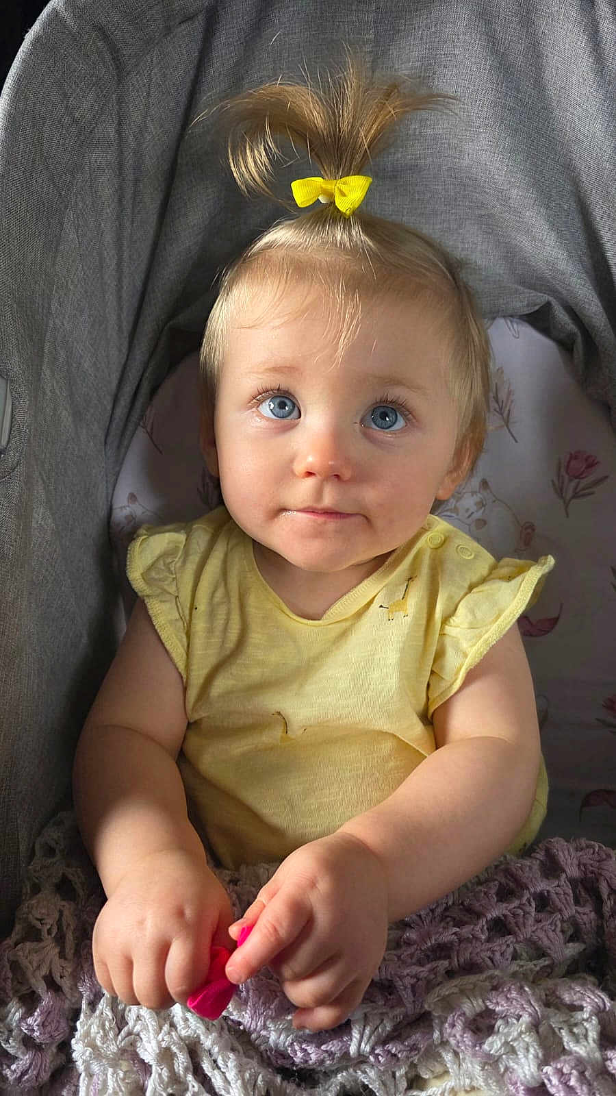 Atlanta-Marie joined the competition — help win amazing prizes! baby, child, blue_eyes, yellow_bow, yellow_shirt, blanket, crocheted_blanket, hand, face, hair, highchair, indoor, infant, person, portrait, cute, curious, seated, soft_lighting, cloth