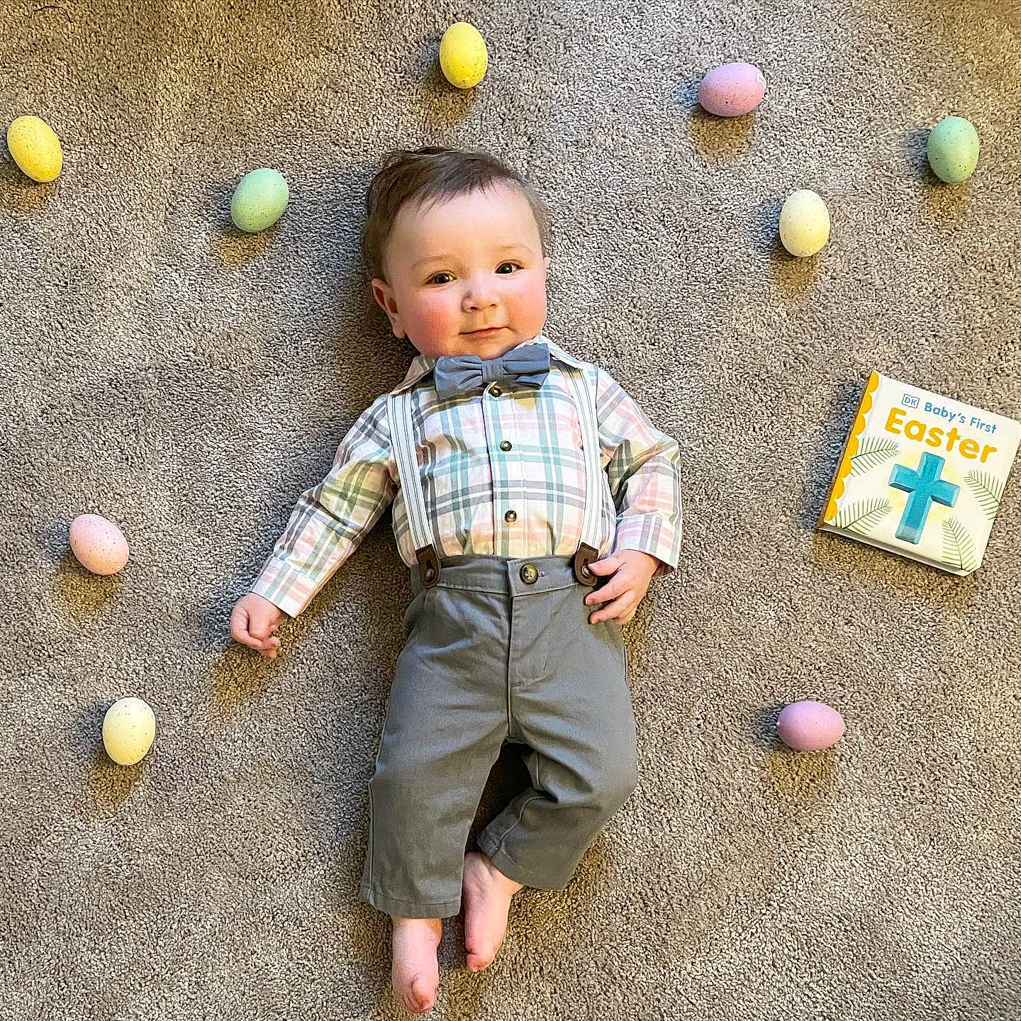 Lennon is registered to the contest to win money with this photo: asphalt, ball, child, facial_expression, flooring, fun, gesture, grass, happy, pattern, people, people_in_nature, person, play, road_surface, smile, standing, toddler, toy, wood
