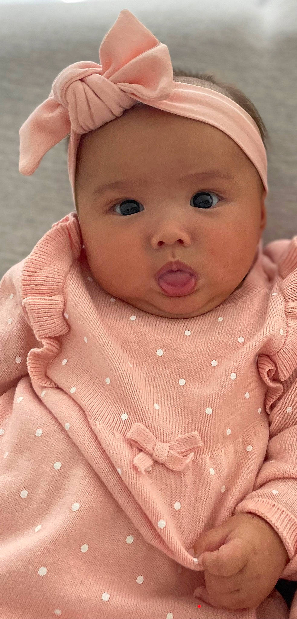 Jade Et Tessa participe au concours pour gagner de l'argent avec cette photo : baby_toddler_clothing, cap, cheek, chin, dress, eye, face, forehead, hand, headwear, human_body, iris, lip, mouth, neck, nose, outerwear, person, pink, product