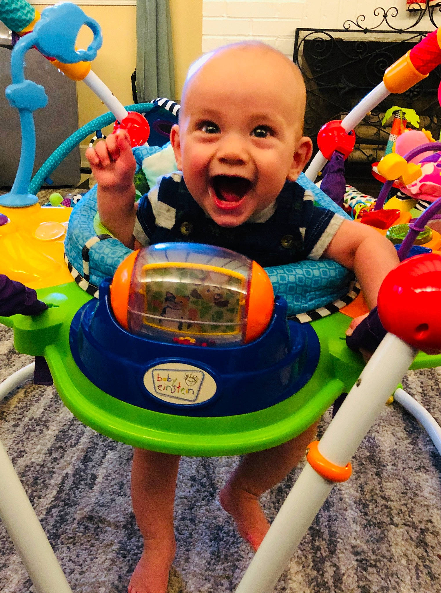 Theo is registered to the contest to win money with this photo: baby, baby_products, baby_toys, child, fun, games, leisure, musical_instrument, person, play, product, recreation, smile, toddler, toy, vacation