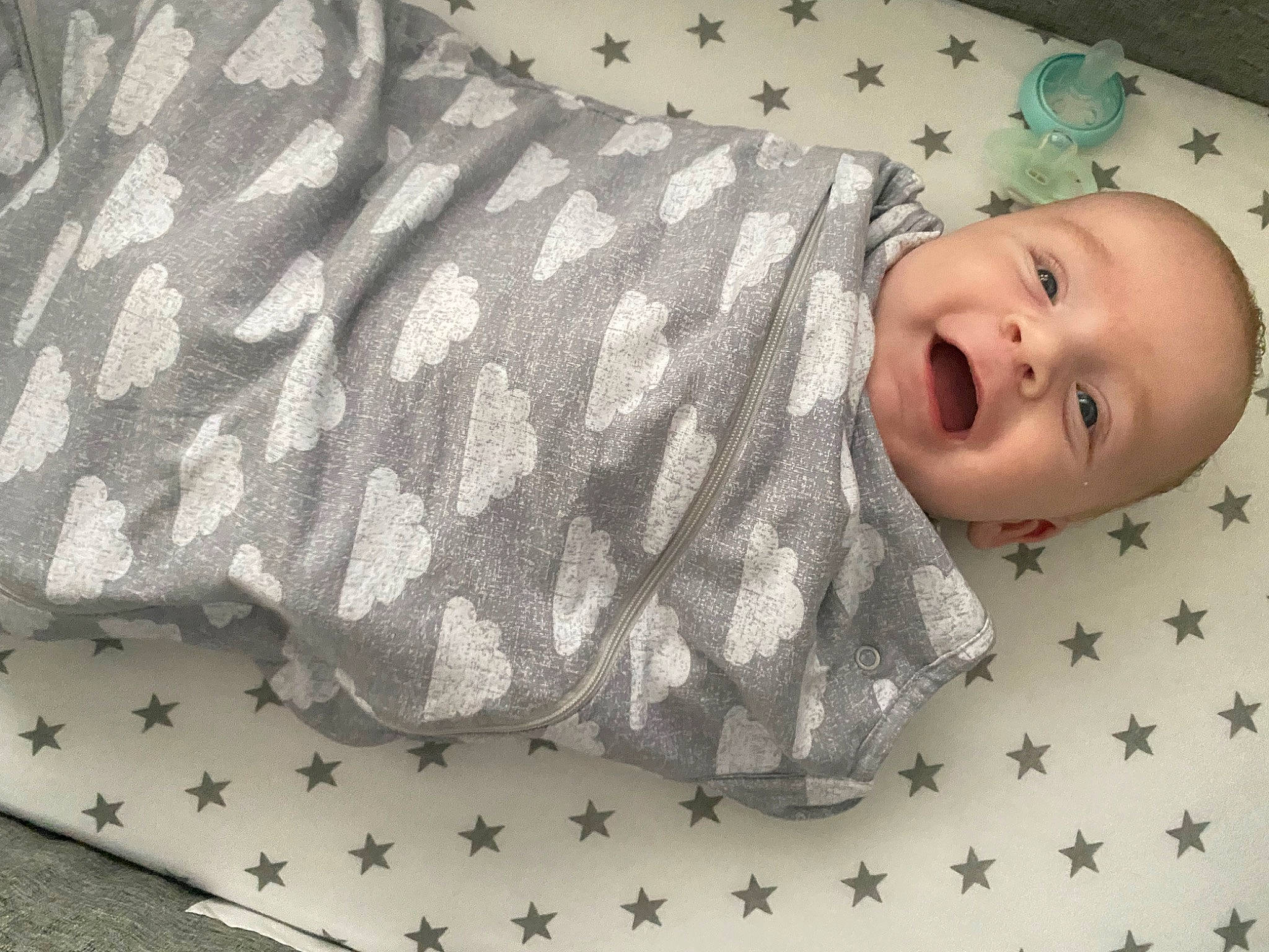 George joined the competition — help win amazing prizes! arm, baby, baby_products, baby_safety, baby_sleeping, baby_toddler_clothing, bedding, bedtime, child, comfort, hand, happy, linens, pattern, person, room, sleep, sleeve, smile, textile