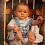 Liam a rejoint le concours — aidez-le/la à gagner de superbes lots ! baby, child, blue_eyes, wooden_crate, romper, suspenders, blanket, foot, hand, wood_floor, portrait, cute, curious, indoor, studio, soft_lighting, infant, sitting, clothing, face