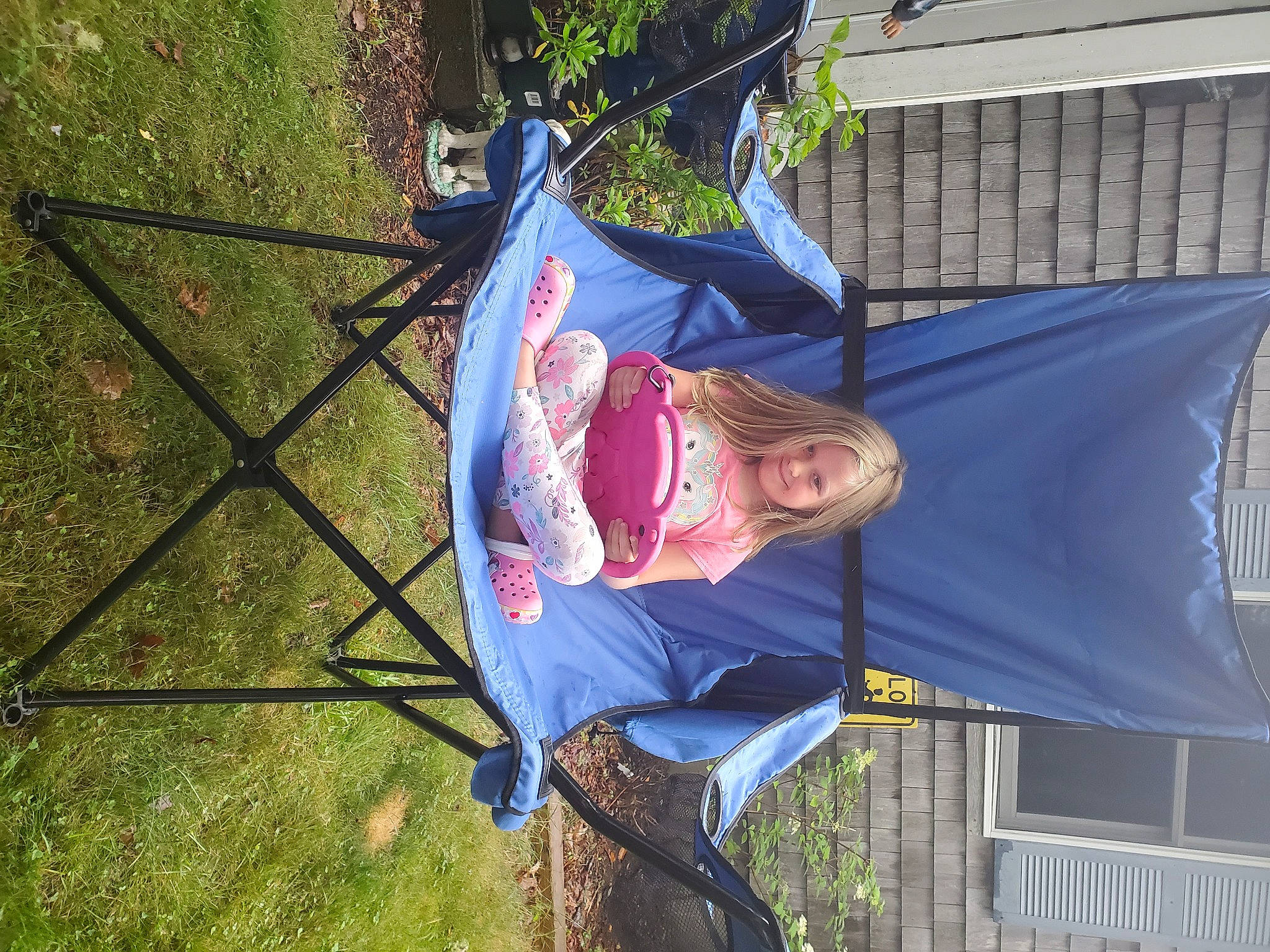 Susan is registered to the contest to win money with this photo: fun, grass, joy, leisure, person, plant, pole, smile, toddler, tree