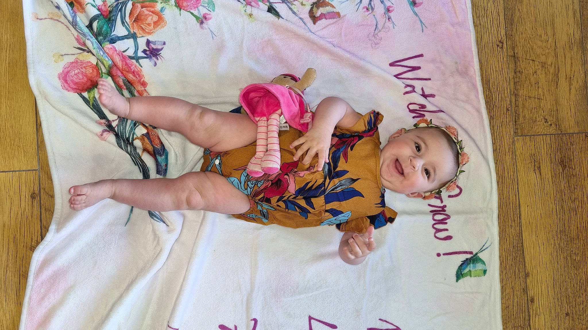 Liana participe au concours pour gagner de l'argent avec cette photo : baby, baby_toddler_clothing, child, dress, eye, face, facial_expression, finger, fun, hand, happy, head, headwear, linens, magenta, pattern, person, pink, skin, sleeve