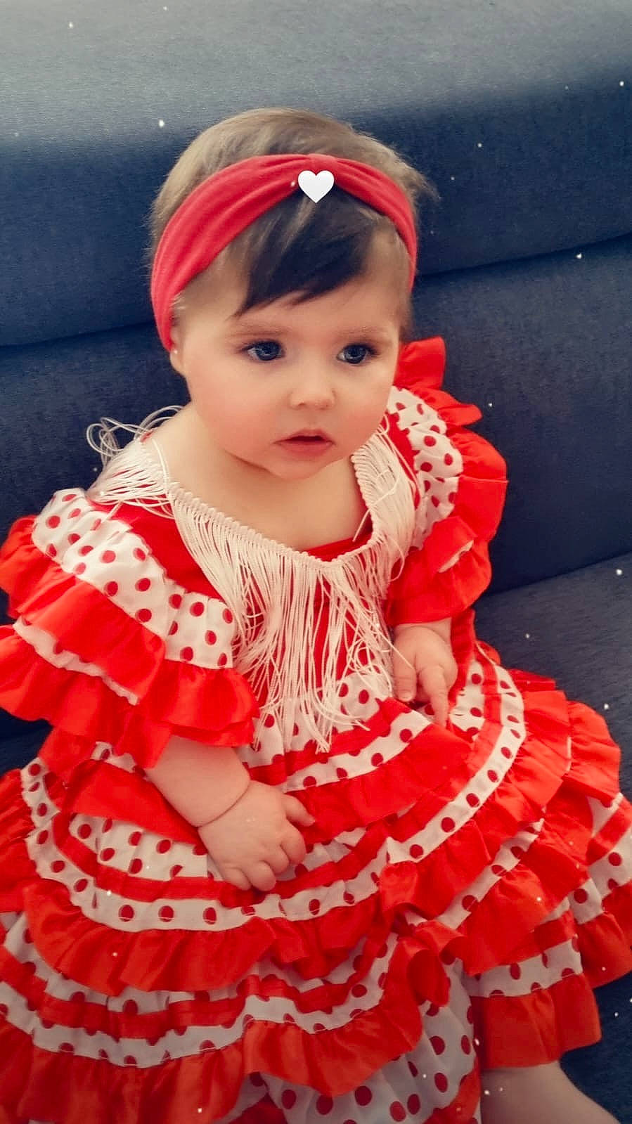 Eva a rejoint le concours — aidez-le/la à gagner de superbes lots ! baby, baby_toddler_clothing, cap, cheek, day_dress, dress, embellishment, face, happy, hat, lip, magenta, one_piece_garment, person, pink, red, skin, sleeve, standing, toddler