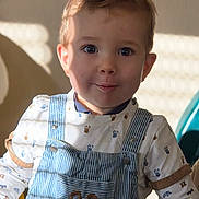 Linda Lecointe participe au concours pour gagner de l'argent avec cette photo : toddler, child, face, eyes, smile, overalls, bunny_patch, striped_clothing, long_sleeve_shirt, indoor, natural_light, shadow, curly_hair, cute, portrait, young_child, fashion, happy, playful, person