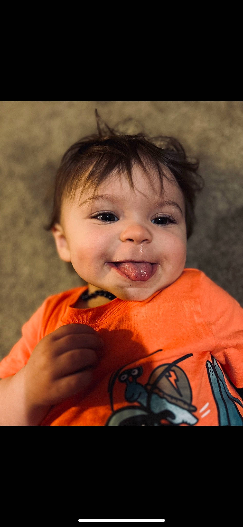 Bryer is registered to the contest to win money with this photo: baby_toddler_clothing, cheek, clothing, eyebrow, eyelash, facial_expression, finger, flash_photography, happy, human_body, iris, joy, lip, mouth, nose, person, skin, sleeve, smile, t_shirt