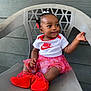 Séyori joined the competition — help win amazing prizes! baby, child, girl, smiling, sitting, chair, plastic_chair, clothing, nike, skirt, socks, hair_accessories, red, white, pink, outdoor, wall, happy, portrait, cute