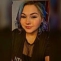 Ashley E. H.
