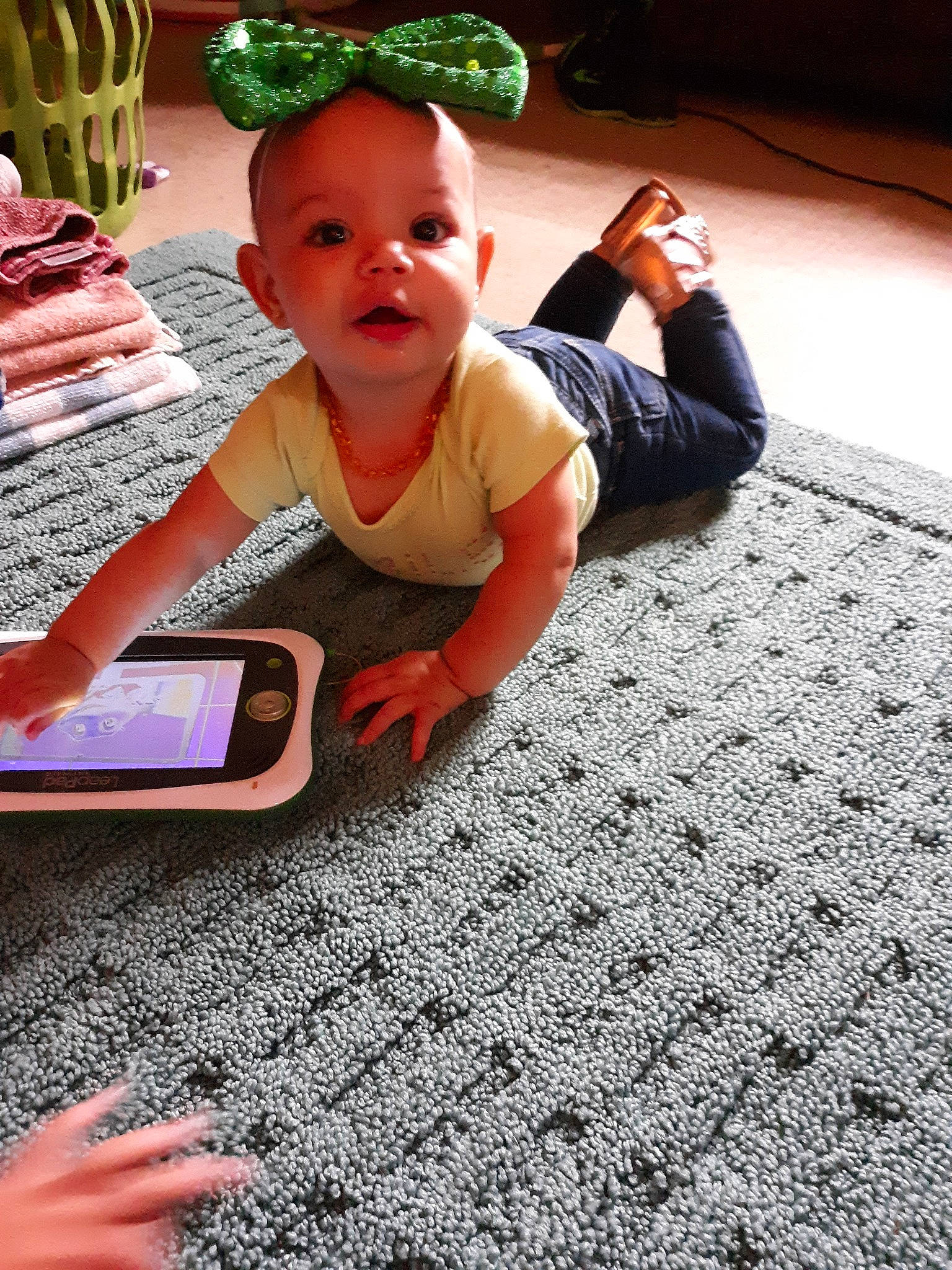 Ayanna joined the competition — help win amazing prizes! baby, carpet, child, crawling, floor, flooring, fun, grass, pattern, person, play, sitting, smile, textile, toddler, vacation