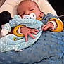 baby, bed, blanket, blue_blanket, car_seat, child, clothing, comfort, cute, face, hand, indoors, infant, newborn, pacifier, polka_dot, portrait, resting, sleepy, soft