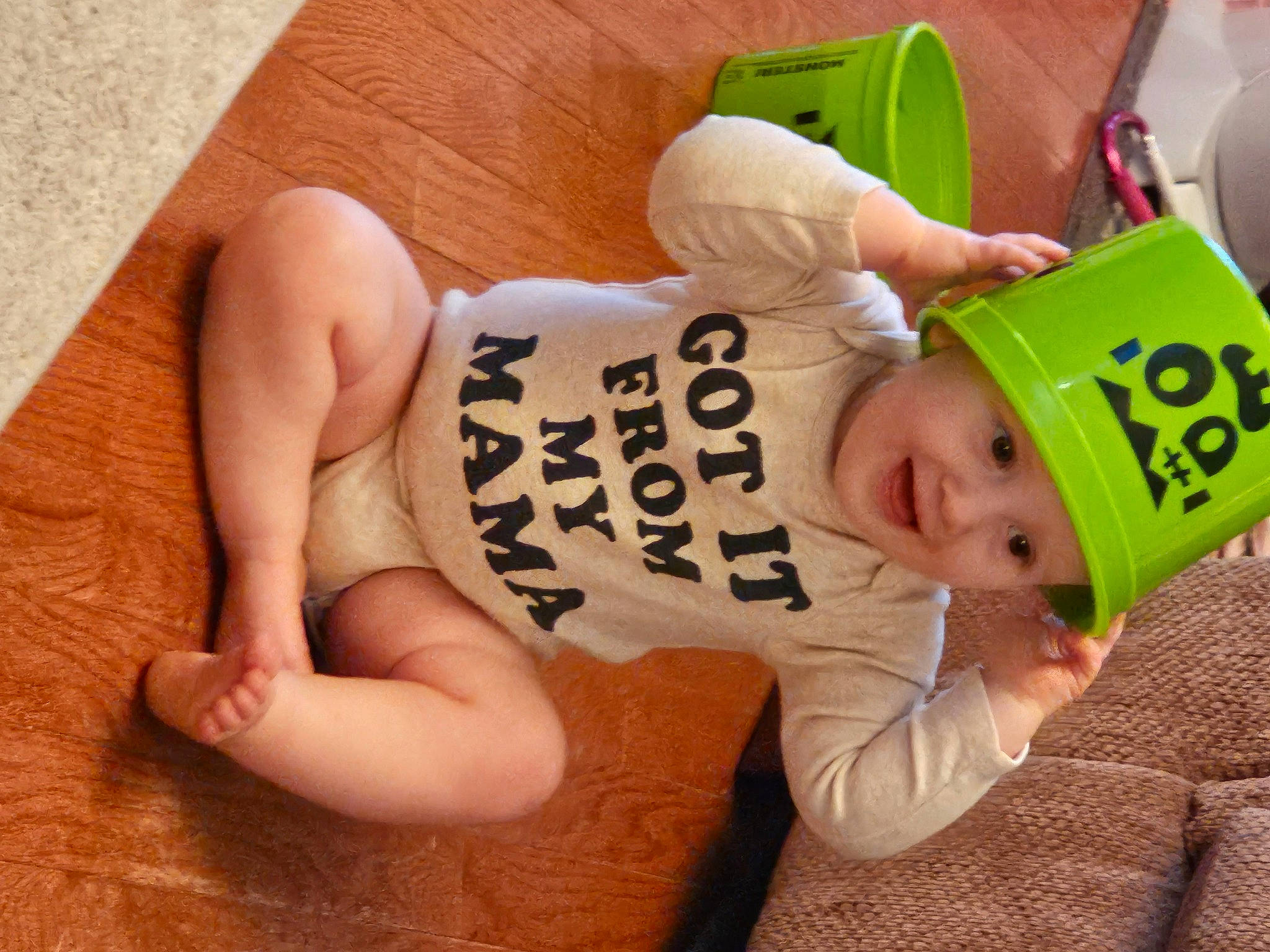 Ariella is registered to the contest to win money with this photo: abdomen, baby, baby_toddler_clothing, chest, child, comfort, elbow, flooring, foot, happy, hat, headgear, headwear, human_leg, joy, knee, person, room, sitting, thigh