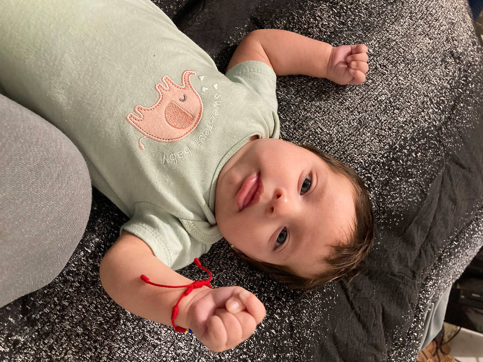 Amirah is registered to the contest to win money with this photo: chest, comfort, elbow, eyelash, finger, flash_photography, gesture, happy, human_body, human_leg, joint, linens, lip, nail, pattern, person, skin, sleeve, textile, thigh