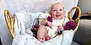 Cirilla joined the competition — help win amazing prizes! baby, basket, blanket, flower, headband, smile, infant, happy, cute, cozy, plush, purple_flower, sitting, skin, child, indoor, portrait, clothing, peaceful, relaxing