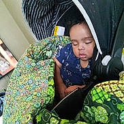 Ya'Quinn joined the competition — help win amazing prizes! baby, blanket, car_seat, child, clothing, comfort, cozy, fabric, face, head, indoors, nap, patterned, peaceful, quilt, rest, seat, sleeping, toddler, young_child
