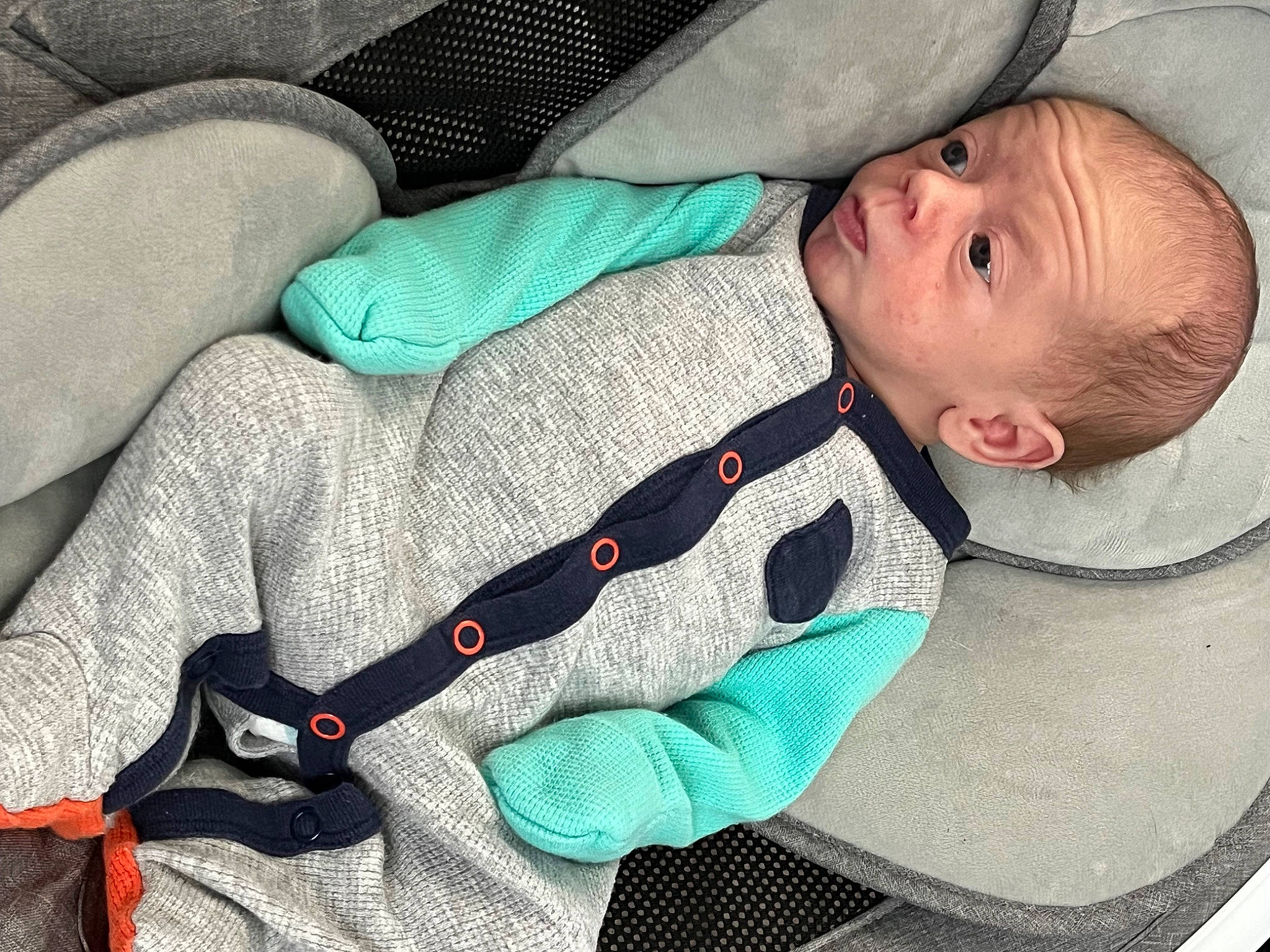 Cole is registered to the contest to win money with this photo: baby, baby_products, baby_safety, baby_sleeping, baby_toddler_clothing, carmine, child, comfort, green, linens, musical_instrument, musical_instrument_accessory, nap, pattern, person, product, sleep, sleeve, toddler, vertebrate