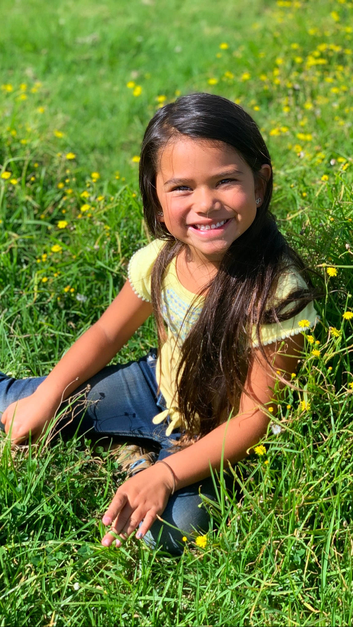 Faith-ann is registered to the contest to win money with this photo: botany, child, child_model, facial_expression, flower, fun, grass, grass_family, grassland, happy, joy, lawn, long_hair, meadow, people_in_nature, person, photography, plant, smile, spring