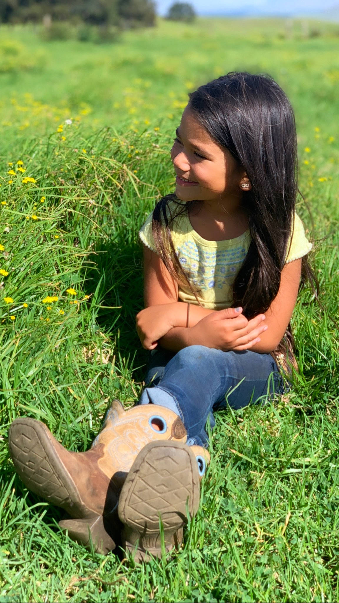 Faith-ann is registered to the contest to win money with this photo: brown_hair, fawn, grass, grass_family, grassland, happy, joy, lawn, long_hair, meadow, people_in_nature, person, photography, plant, prairie, sitting, smile