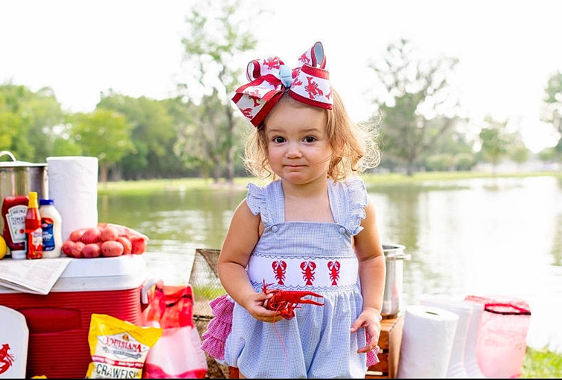 Whitley is registered to the contest to win money with this photo: baby, child, headgear, party_hat, party_supply, person, play, recreation, summer, toddler