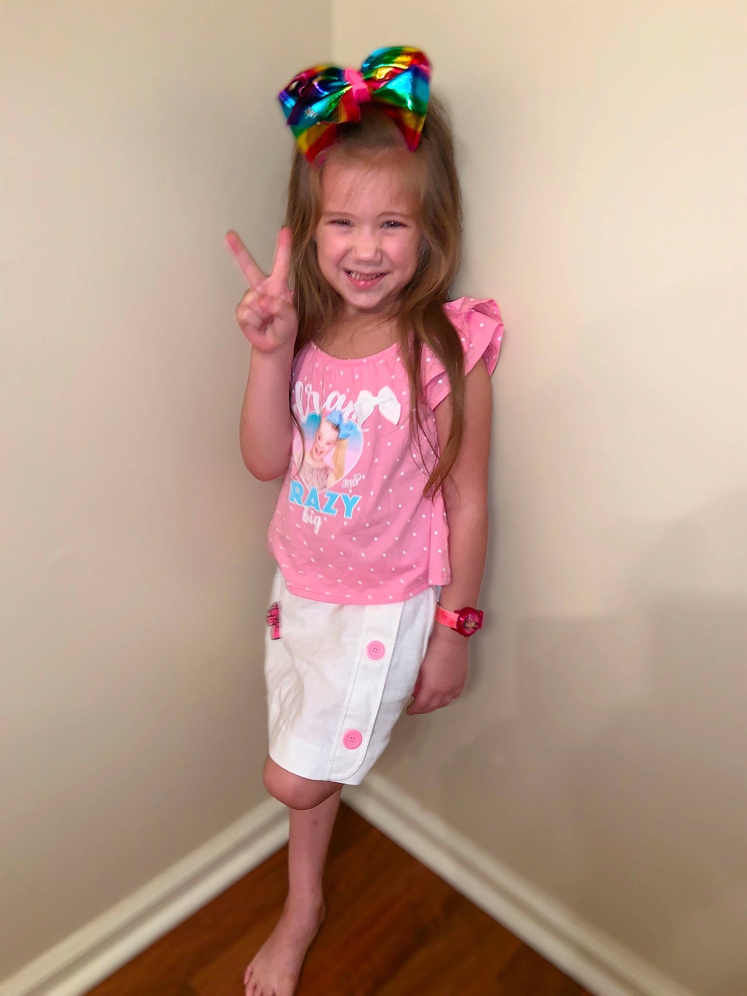 Baileigh is registered to the contest to win money with this photo: baby_toddler_clothing, child, clothing, costume, dress, hair_accessory, headband, headgear, joy, pattern, person, pink, sleeve, smile, t_shirt, toddler