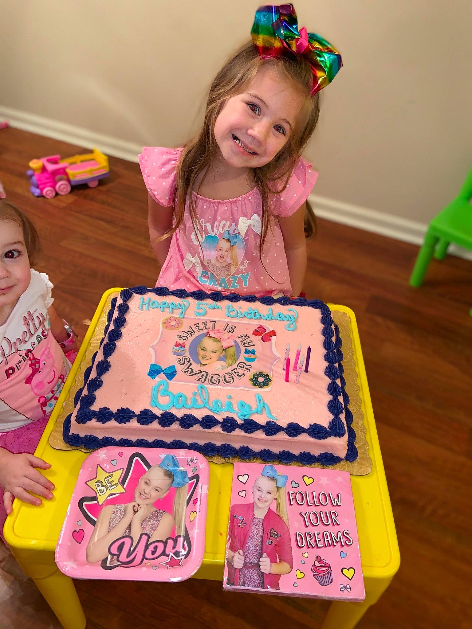 Baileigh is registered to the contest to win money with this photo: baked_goods, baking, birthday, birthday_cake, birthday_party, buttercream, cake, cake_decorating, child, dessert, food, icing, joy, party, pasteles, person, pink, play, royal_icing, sugar_paste