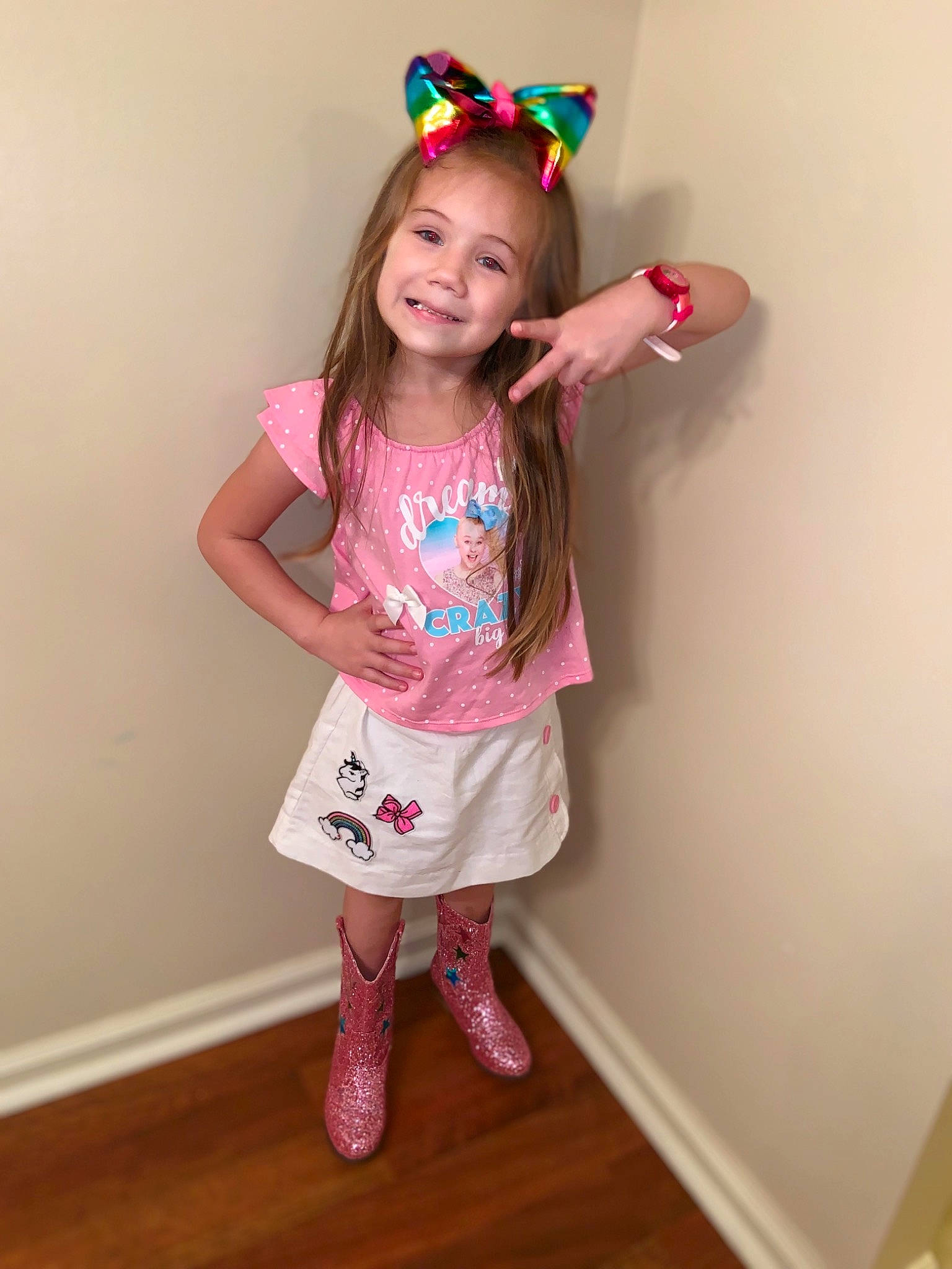 Baileigh is registered to the contest to win money with this photo: baby_toddler_clothing, child, clothing, costume, crown, hair_accessory, joy, pattern, person, pink, sleeve, smile, t_shirt, toddler