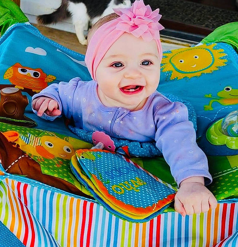 Breelyn joined the competition — help win amazing prizes! art, baby, baby_playing_with_toys, baby_products, baby_toddler_clothing, baby_toys, blue, child, companion_dog, fun, grass, green, happy, headwear, joy, pattern, person, play, product, sleeve