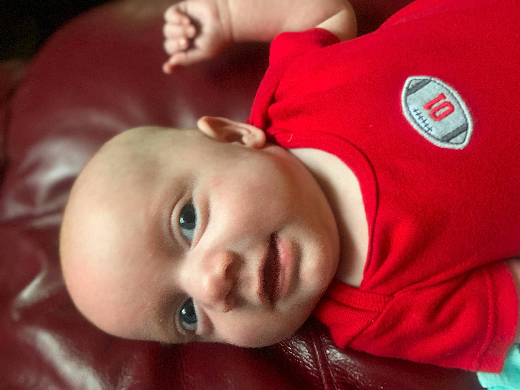 David Jr joined the competition — help win amazing prizes! baby, baby_toddler_clothing, cheek, chin, comfort, eyebrow, eyelash, facial_expression, flash_photography, happy, head, lip, mouth, nose, person, red, skin, sleeve, smile, textile