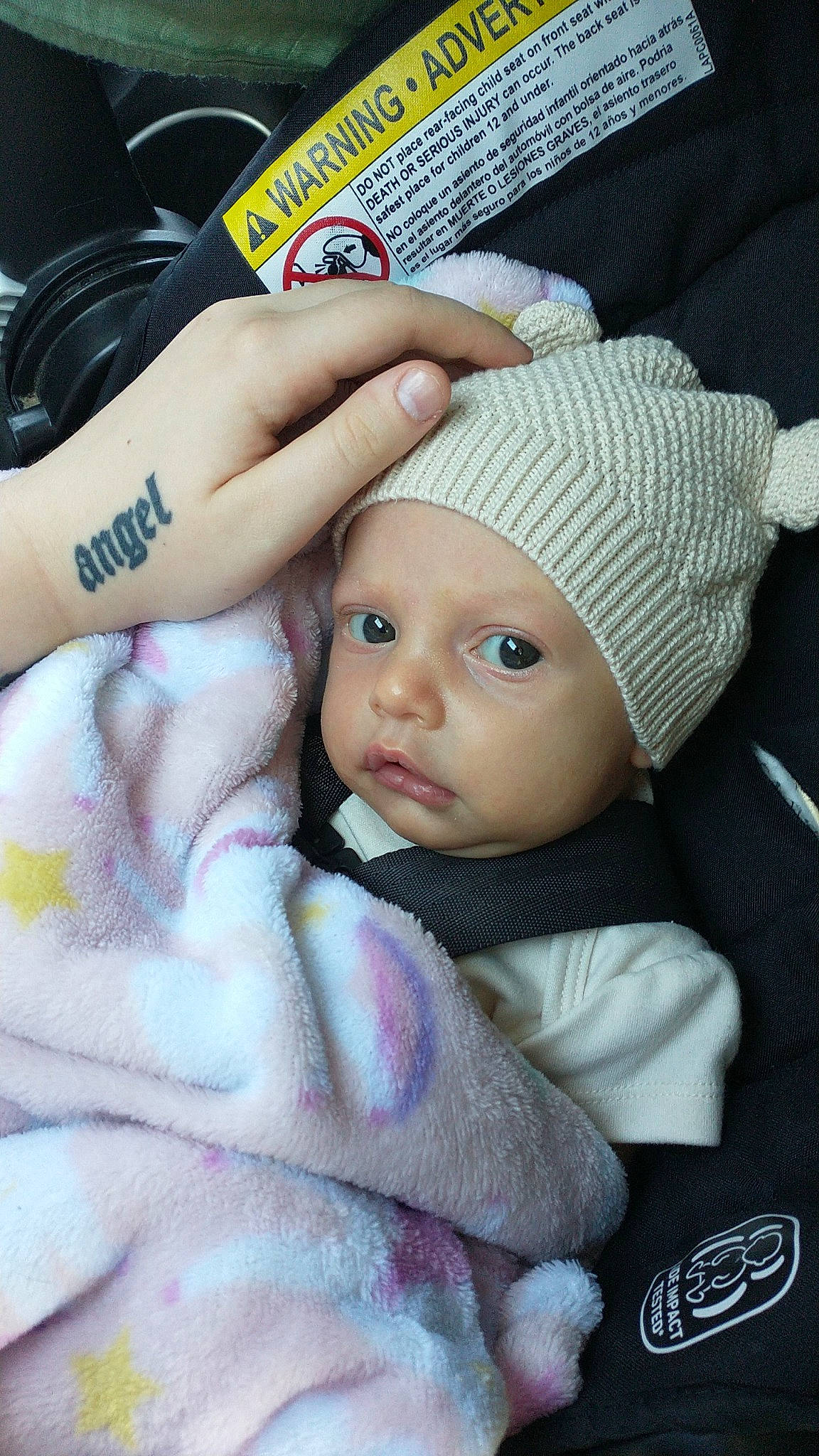 Adelynn joined the competition — help win amazing prizes! art, baby, beanie, cap, cheek, child, eyelash, fashion_accessory, gesture, headwear, knit_cap, linens, nail, pattern, person, skin, textile, thumb, toddler, wool