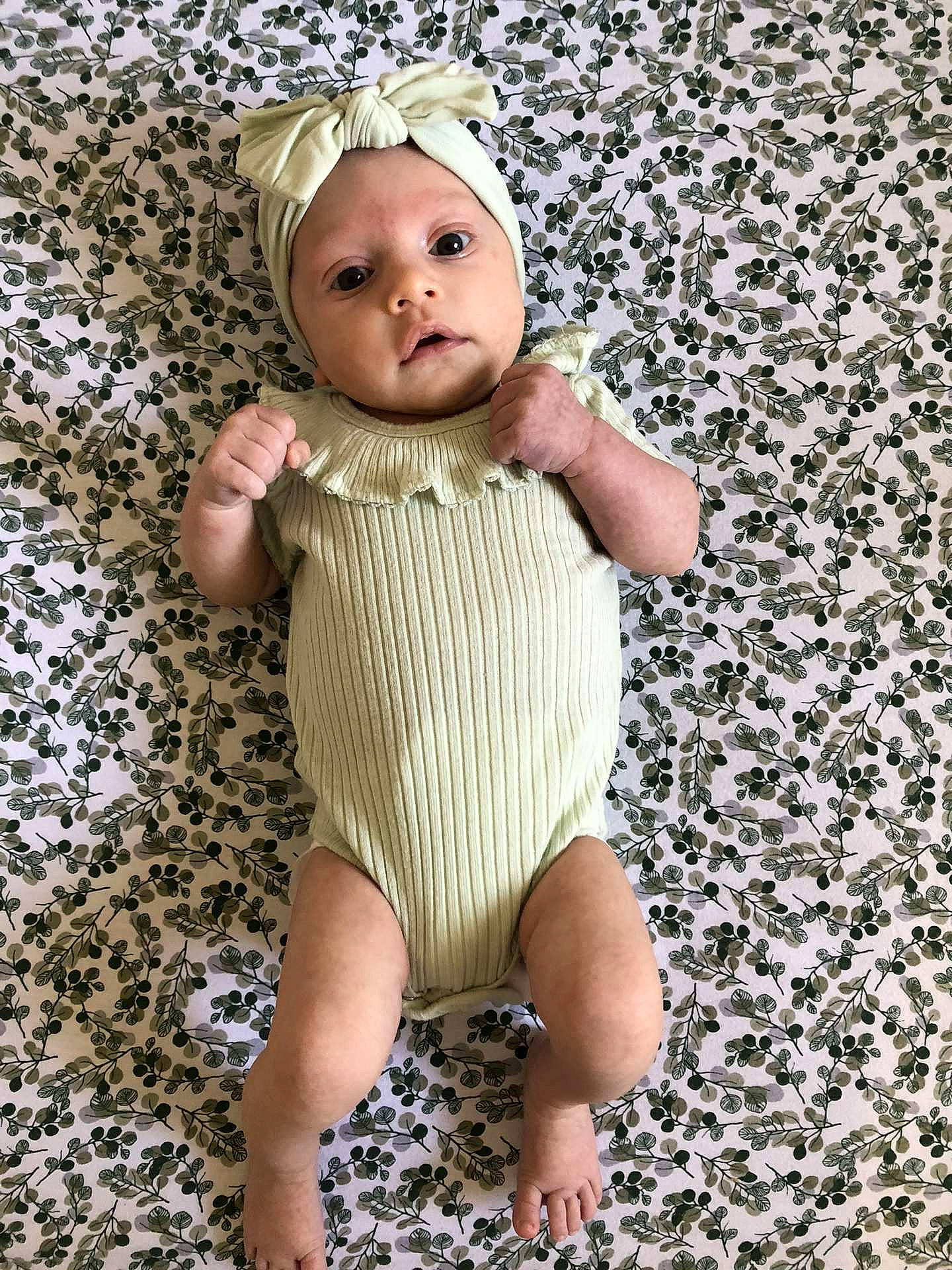 Adelynn joined the competition — help win amazing prizes! baby, baby_toddler_clothing, barefoot, child, eye, face, fawn, flooring, foot, grass, hand, headband, headwear, human_leg, nail, pattern, people_in_nature, person, skin, sleeve