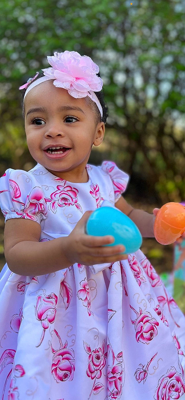 Sarai joined the competition — help win amazing prizes! baby_toddler_clothing, blue, child, clothing, facial_expression, fun, grass, happy, headband, headpiece, headwear, human, joy, leisure, magenta, people_in_nature, person, pink, red, skin