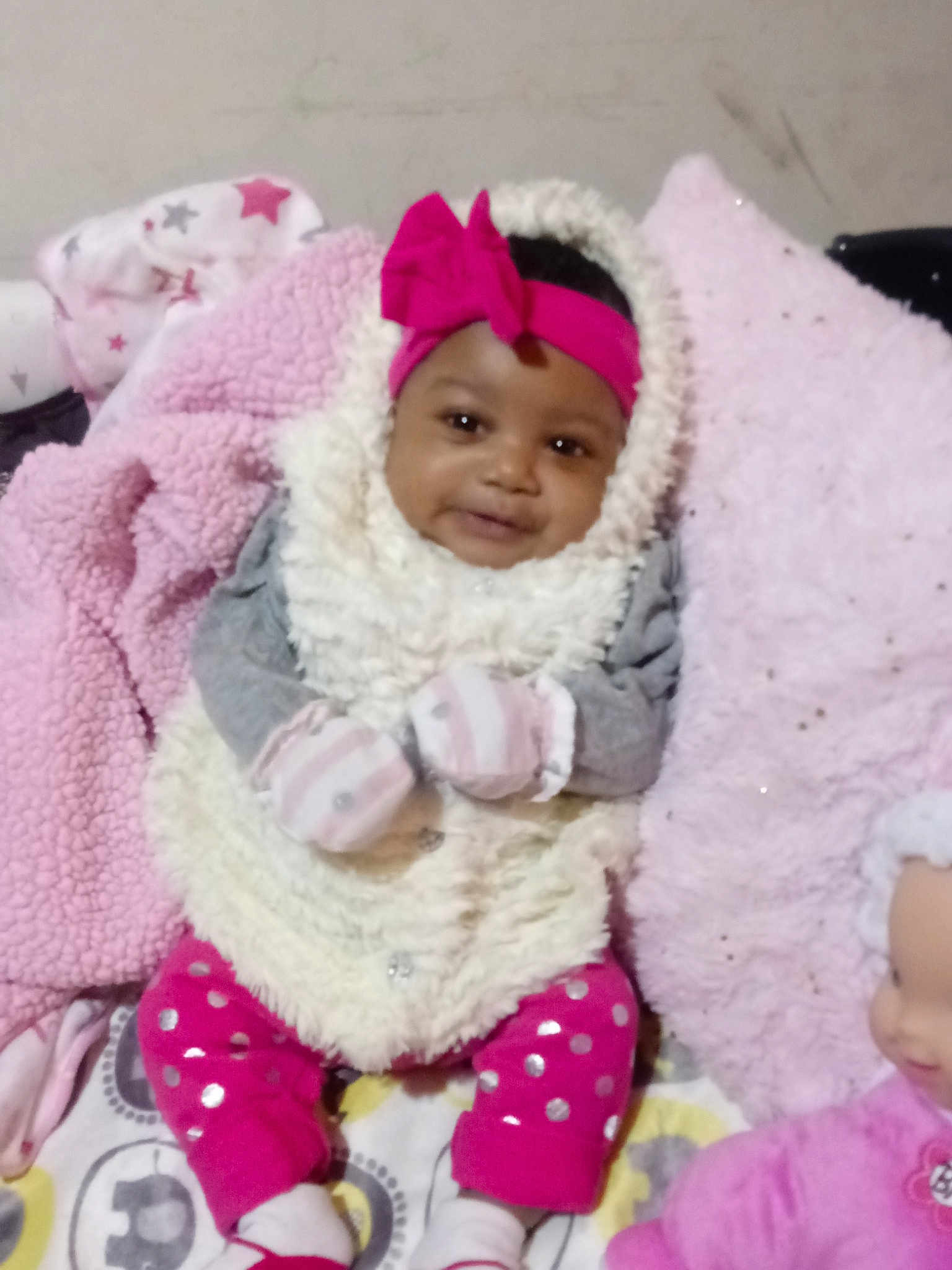 Xya joined the competition — help win amazing prizes! baby, baby_products, bonnet, child, crochet, fur, headgear, person, pink, product, skin, smile, toddler, wool