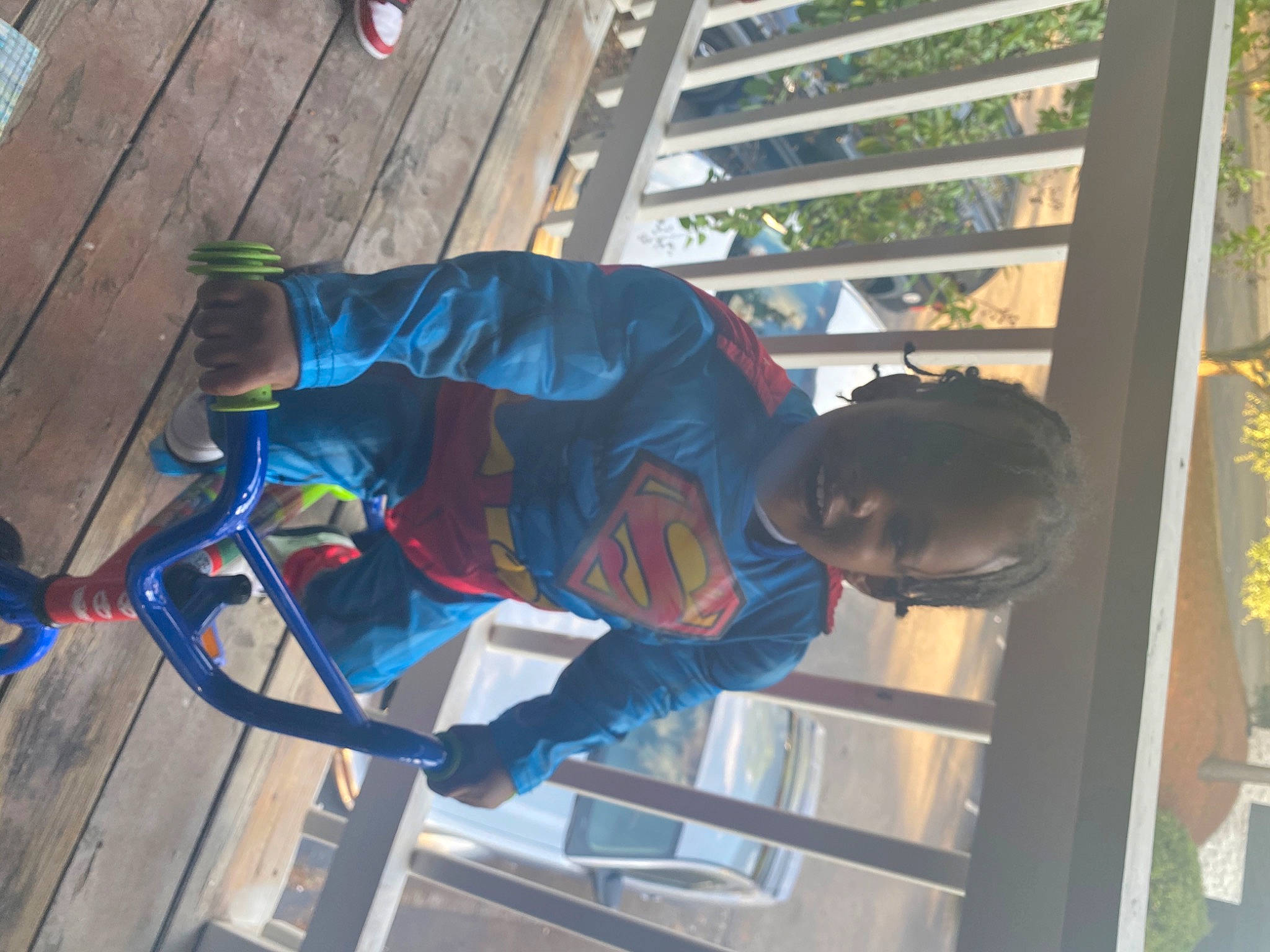 Kye is registered to the contest to win money with this photo: building, electric_blue, fun, hardwood, joy, leisure, person, plant, recreation, toddler, tree, vertebrate, walking_shoe, wood