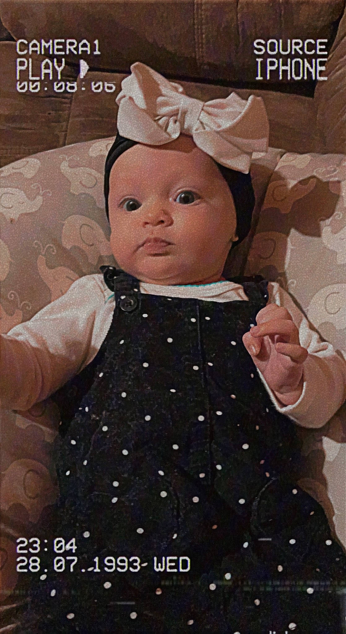 Oaklynn is registered to the contest to win money with this photo: baby, baby_products, baby_toddler_clothing, bow_tie, cheek, child, costume_hat, eyelash, face, font, happy, one_piece_garment, outerwear, pattern, person, photo_caption, pink, sleeve, textile, toddler