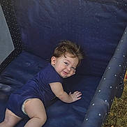 Benson joined the competition — help win amazing prizes! baby, child, smiling, playpen, onesie, sneakers, toddler, outdoor, grass, blue, happy, cute, infant, face, person, young, crawling, footwear, clothing, toy