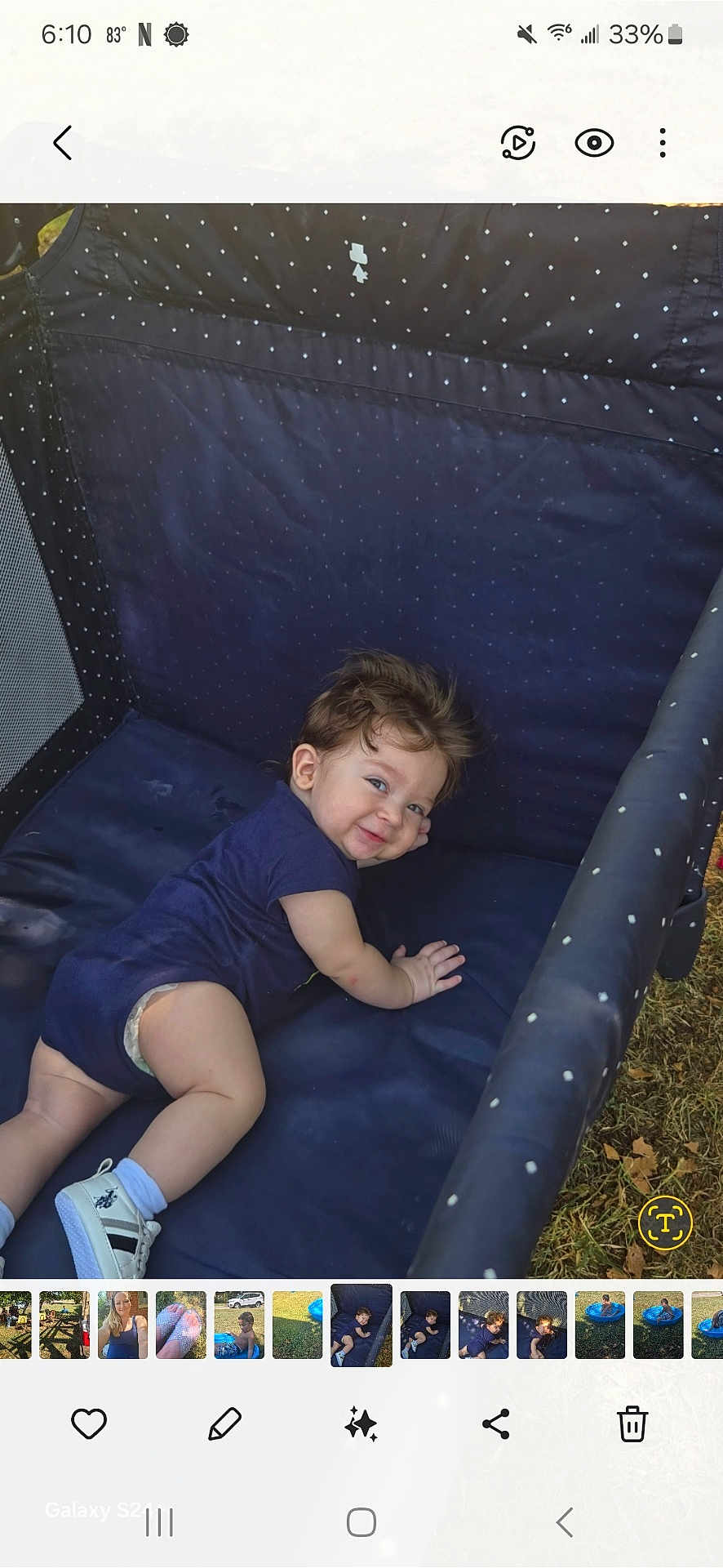 Benson joined the competition — help win amazing prizes! baby, child, smiling, playpen, onesie, sneakers, toddler, outdoor, grass, blue, happy, cute, infant, face, person, young, crawling, footwear, clothing, toy