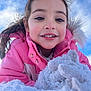 Jade participe au concours pour gagner de l'argent avec cette photo : child, girl, smile, face, winter_coat, pink_clothing, snow, outdoor, blue_sky, cold_weather, gloves, happy, play, portrait, nature, young, person, fun, winter, snow_play