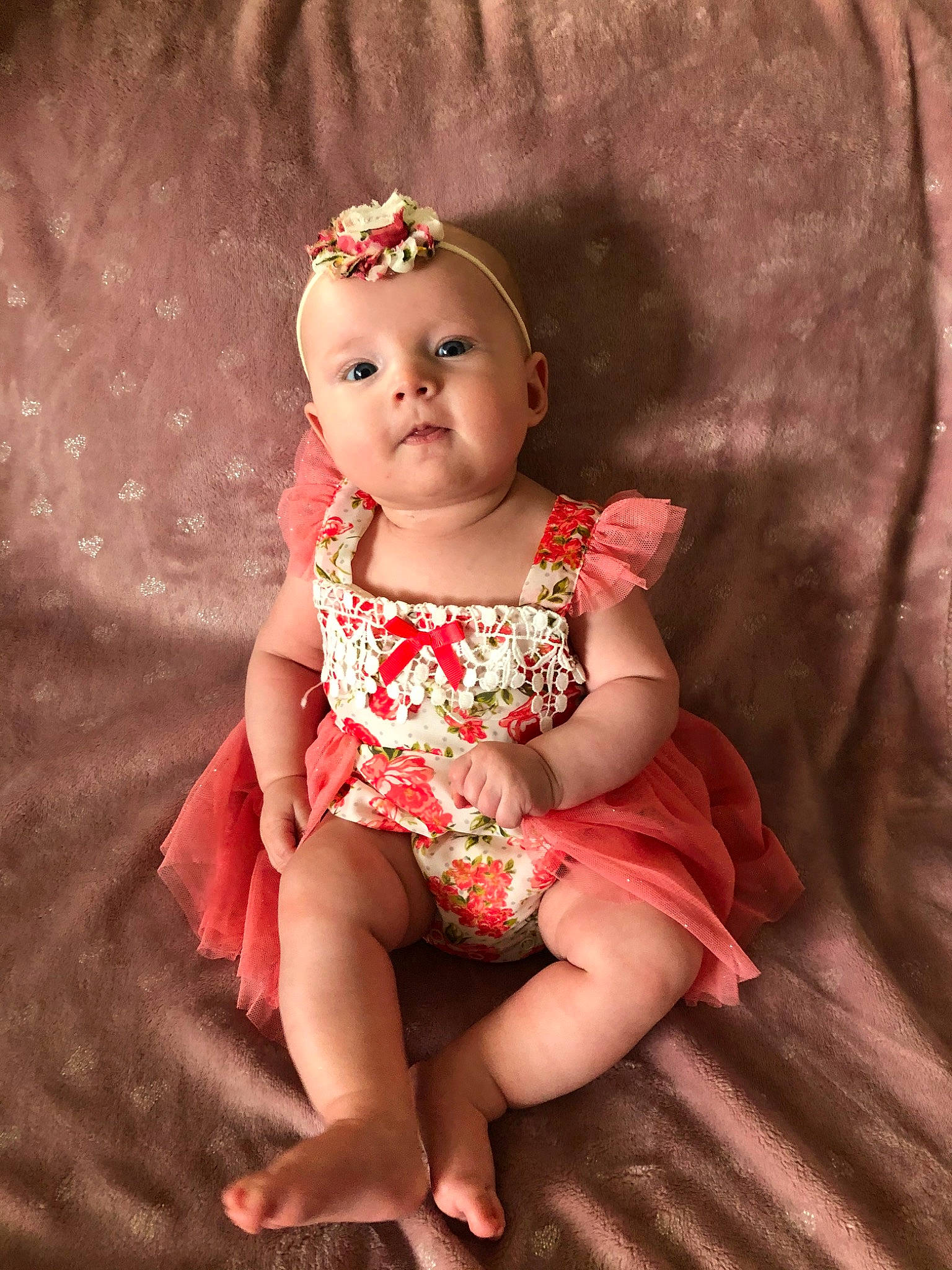 Jurnee is registered to the contest to win money with this photo: baby, cheek, child, child_model, hair_accessory, person, pink, sitting, skin, smile, toddler